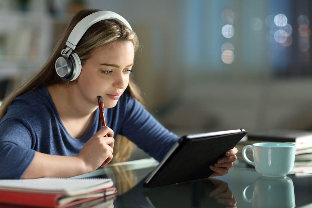 A teenager learning with Tablets.